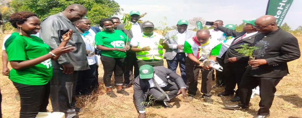 Soroti RDC Salim Komakech planting a tree during World Wetlands Day celebrations in Gweri Sub-county